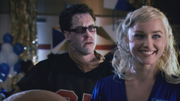 Michael McKiddy, the unmasked seal, and Natalie Victoria in "Deadheads"